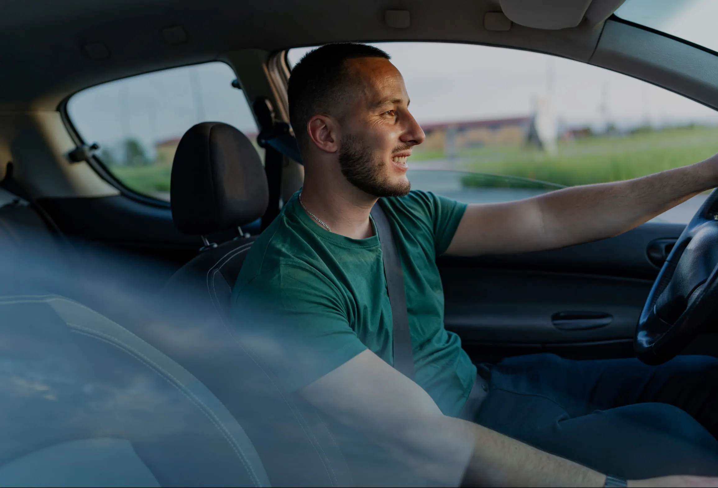 A man driving his car