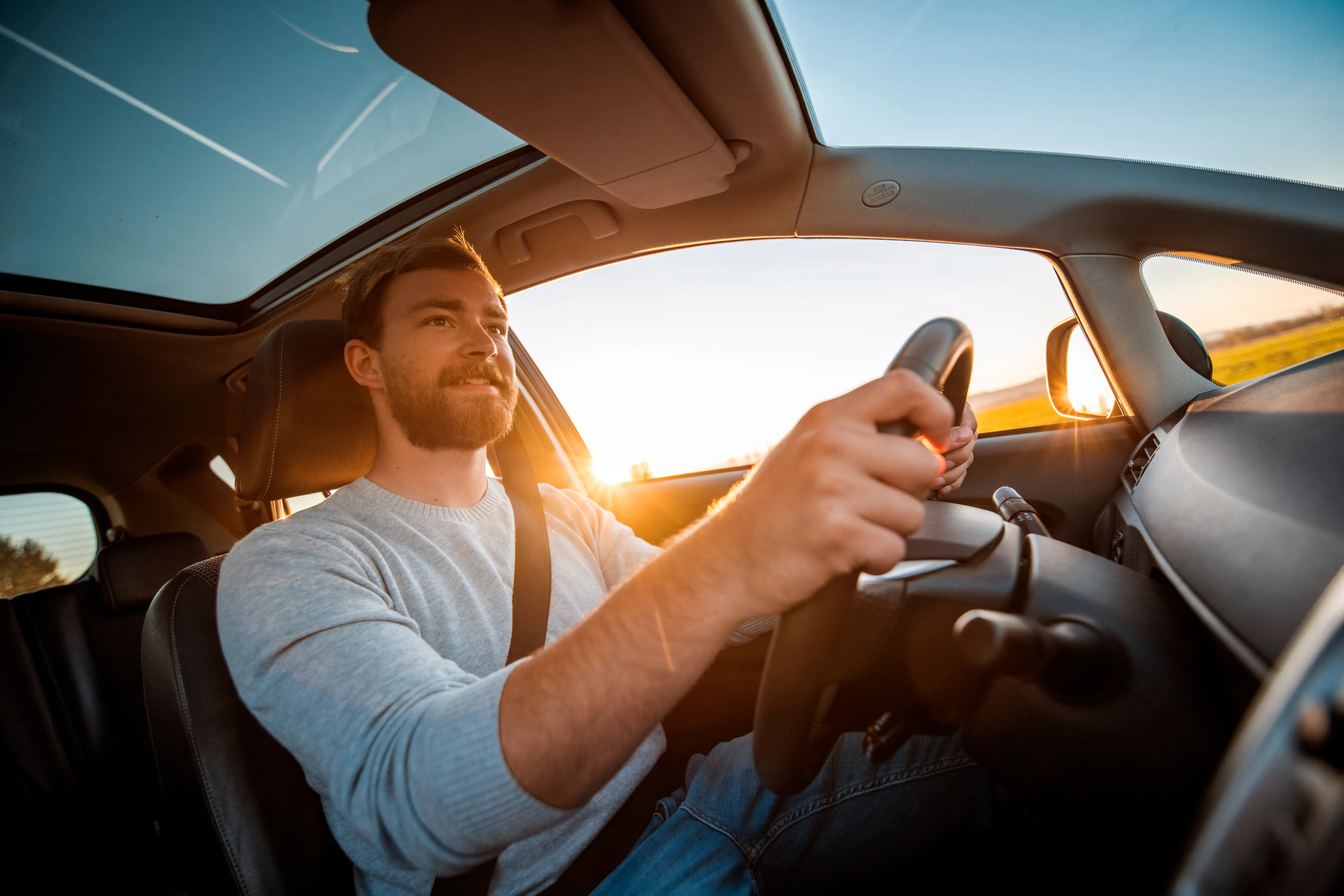 Driving with sunlight in the background