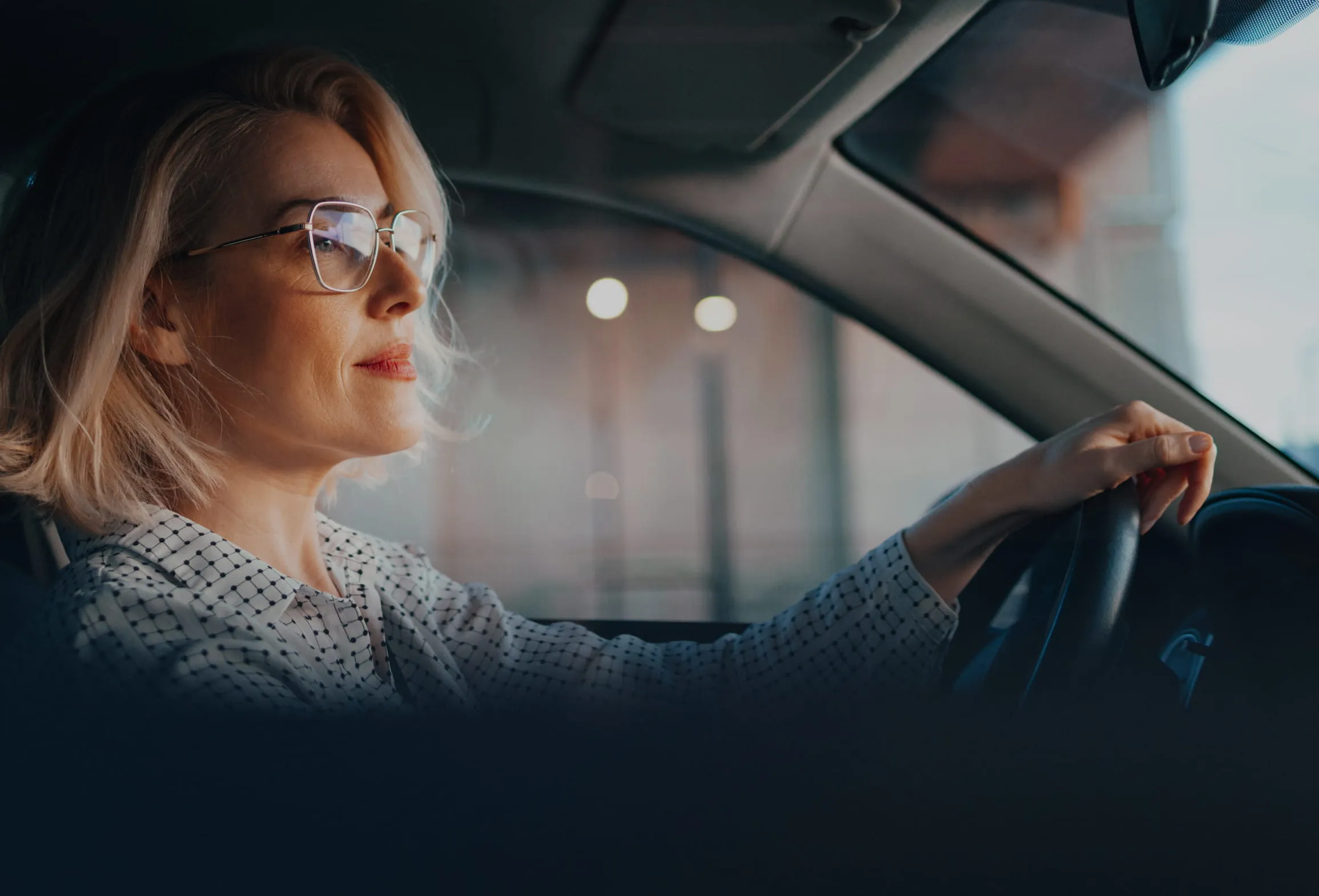 A woman driving her car